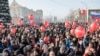 RUSSIA -- People raise hands at a rally of Russian opposition politician Aleksei Navalny in Novokuznetsk, December 9, 2017