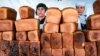 Dushanbe, Tajikistan - Sellers of bread at Market in Dushanbe